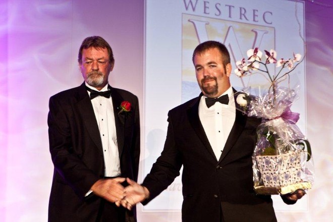 DCA-Gary Groenewold, Westrec Marinas, Captain Kelly Esser Accepting Award on behalf of David Hill’s Family © SW